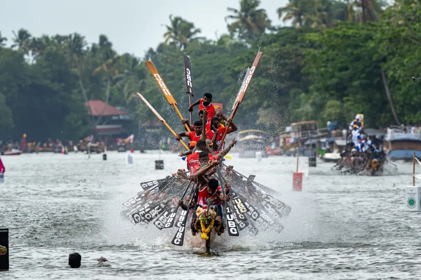 BPG Media broadcast: a snake boat crew charging head-on through the spray